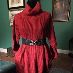 Over sized turtle neck sweater with pockets.